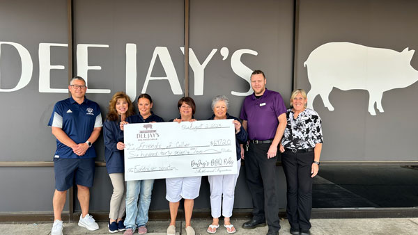 Dee Jay's community partners present a check of $647.20 to be donated to Friends of Collier.